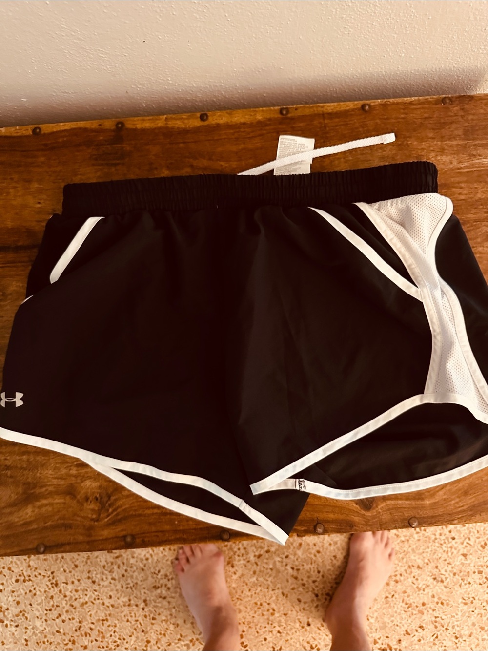 Under kick Armor Women’s Black Athletic Shorts with White Trim